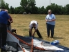 Three to put up a one man tent and the XYL with the instructions.